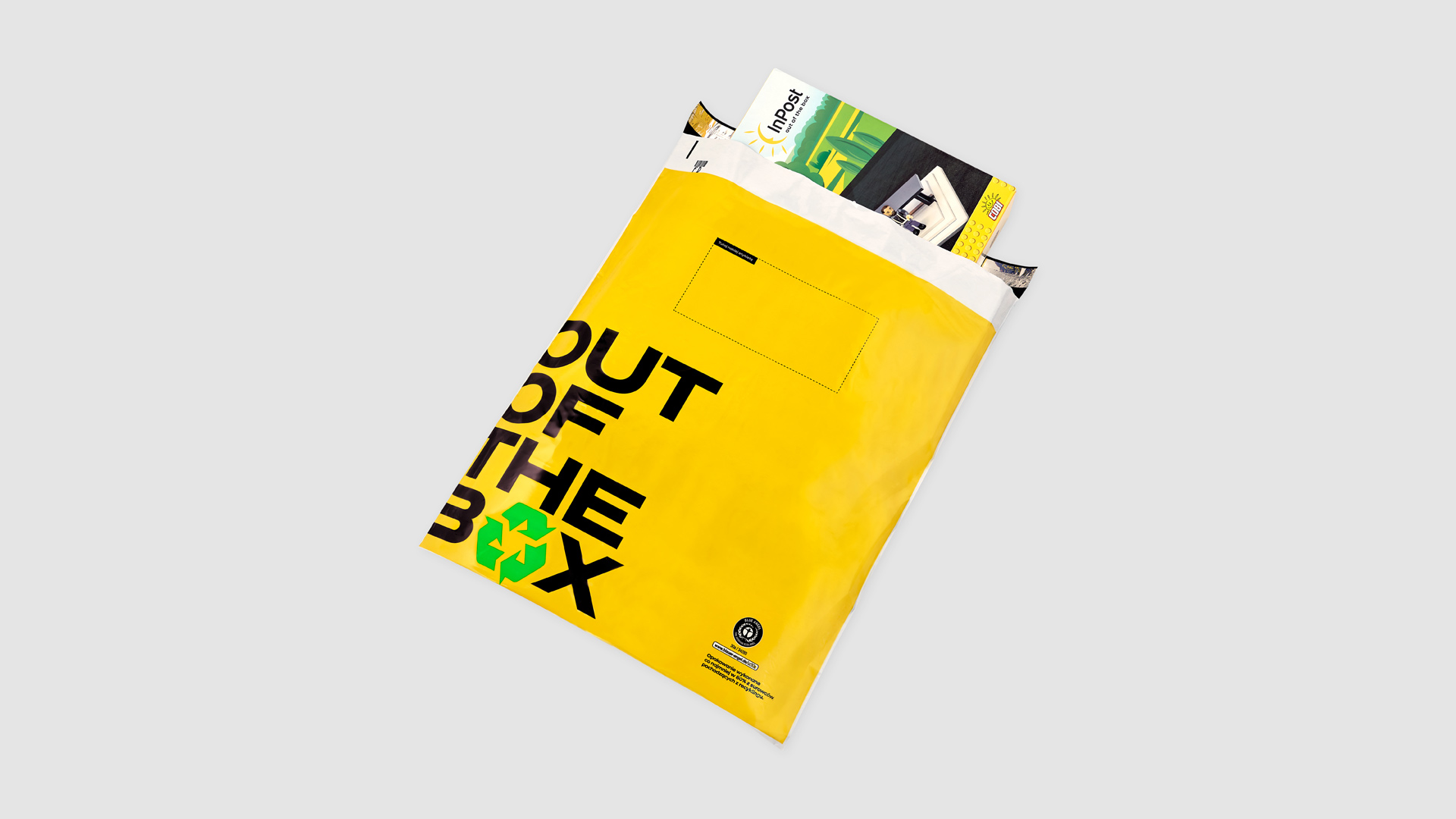 Foliopak żółty z napisem Out Of The Box